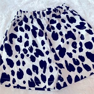 Black & White Cow Print Flare Shorts
